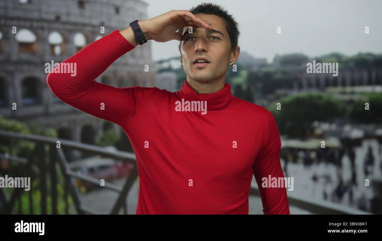 Hispanic man shading eyes with hand while gazing into the distance at ...