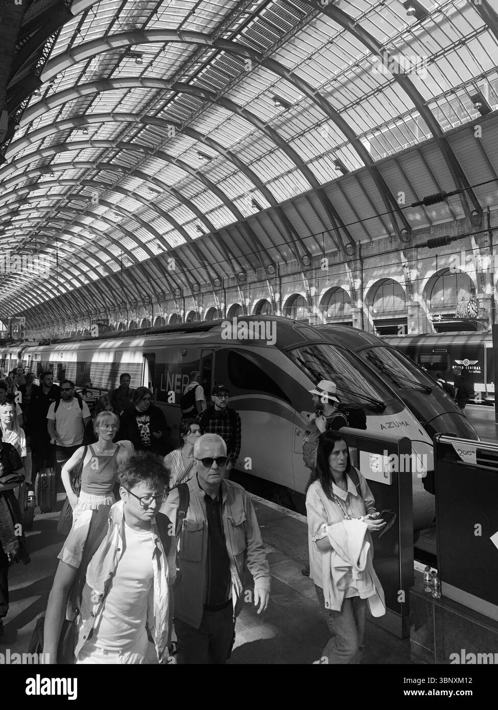 Train from Inverness to London Kings Cross railway Station first class people boarding waiter waitress holiday person people tourists suitcases UK - Smartphone Captured Stock Image