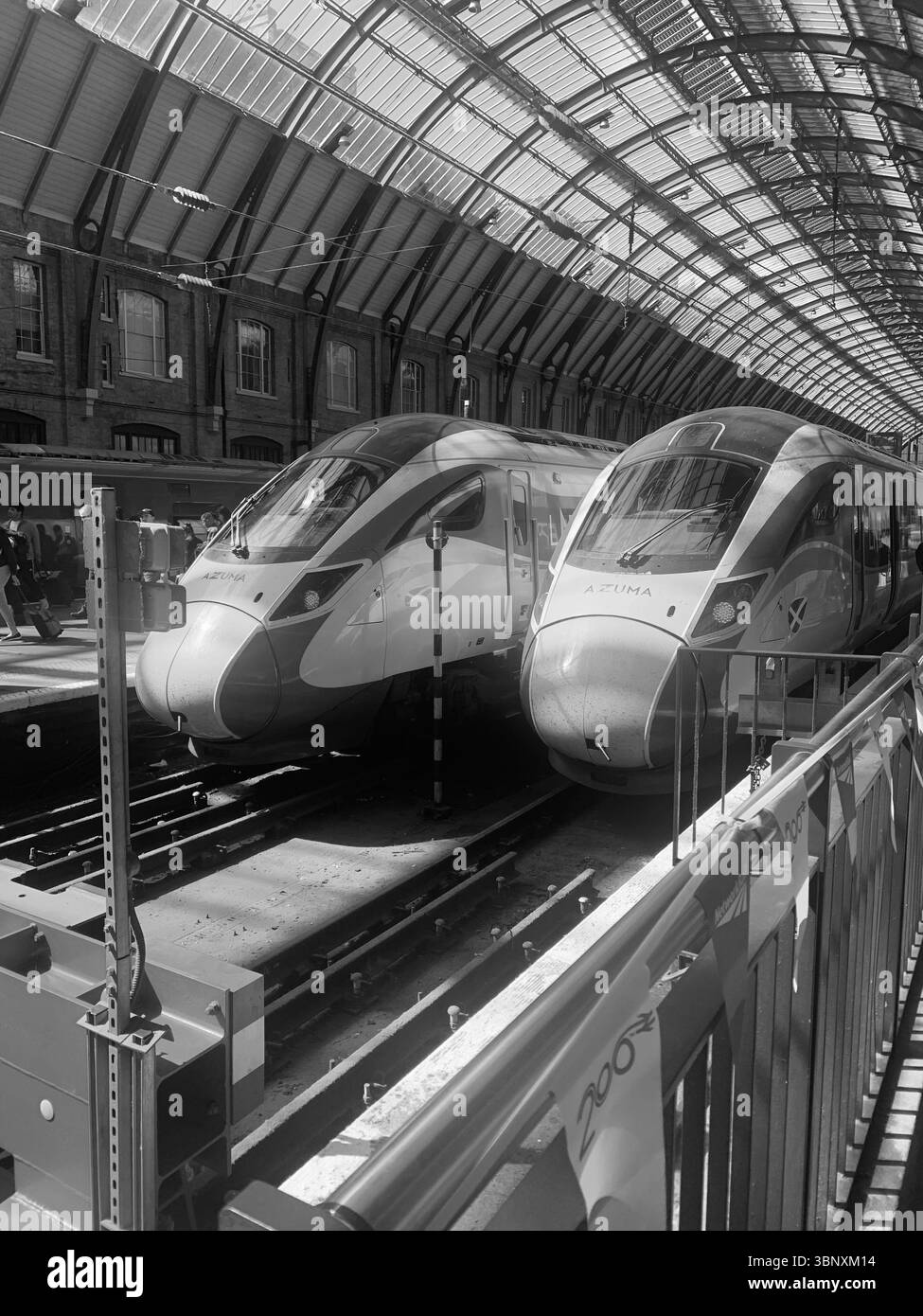 Train from Inverness to London Kings Cross railway Station first class people boarding waiter waitress holiday person people tourists suitcases UK - Smartphone Captured Stock Image