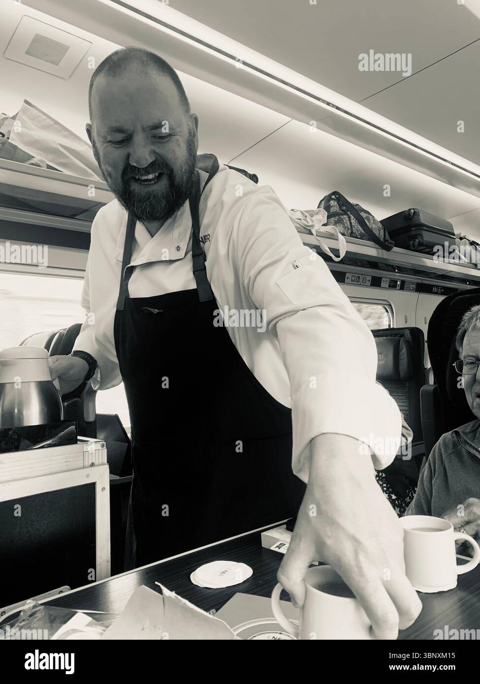 Train from Inverness to London Kings Cross railway Station first class people boarding waiter waitress holiday person people tourists suitcases UK - Smartphone Captured Stock Image