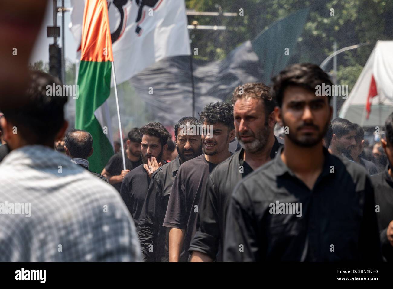 Kashmiri Shia Muslims walk while shouting religious poetry during a ...