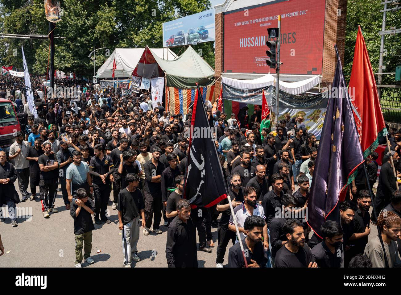 Kashmiri Shia Muslims walk while shouting religious poetry during a ...