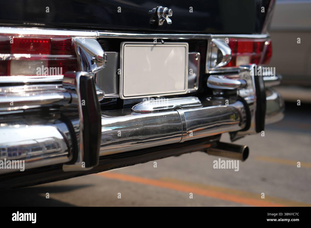 The position and mounting of license plates on classic cars, showing ...