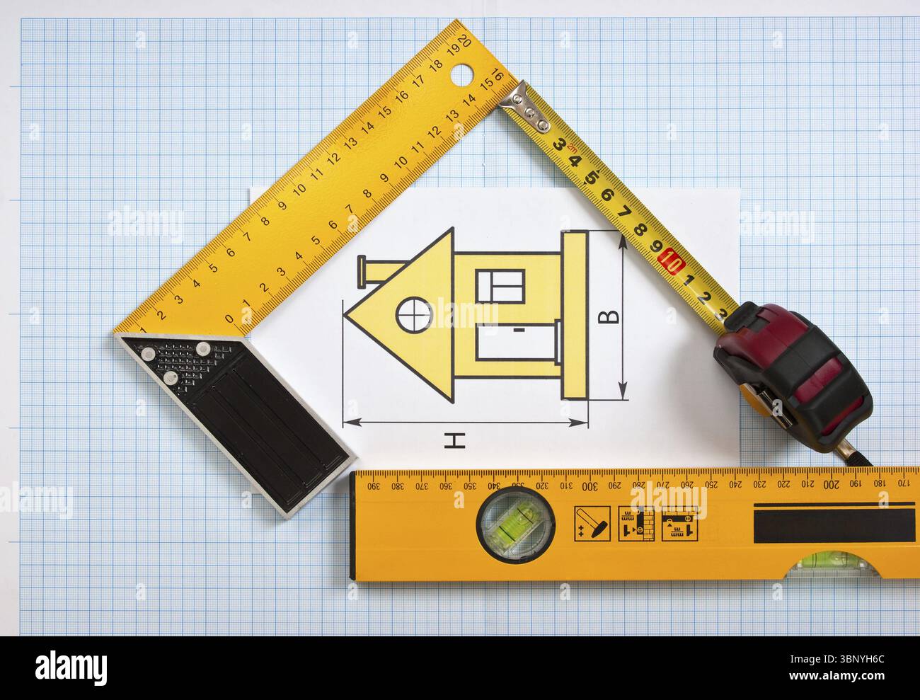 Construction drawings and tools on graph paper Stock Photo