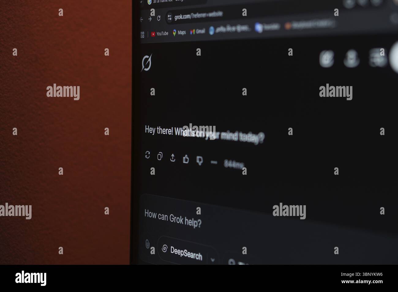 A screen displaying a website in dark mode with a message prompt Stock Photo