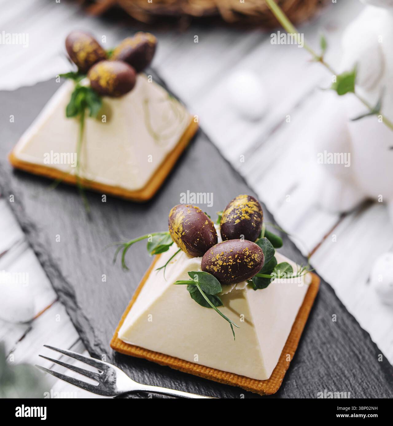 Dessert souffle cookies with chocolate Easter eggs Stock Photo