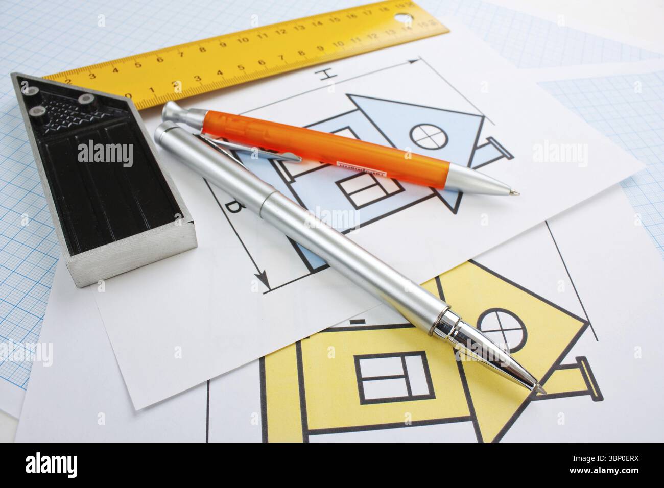 Development drawings and tools on graph paper Stock Photo