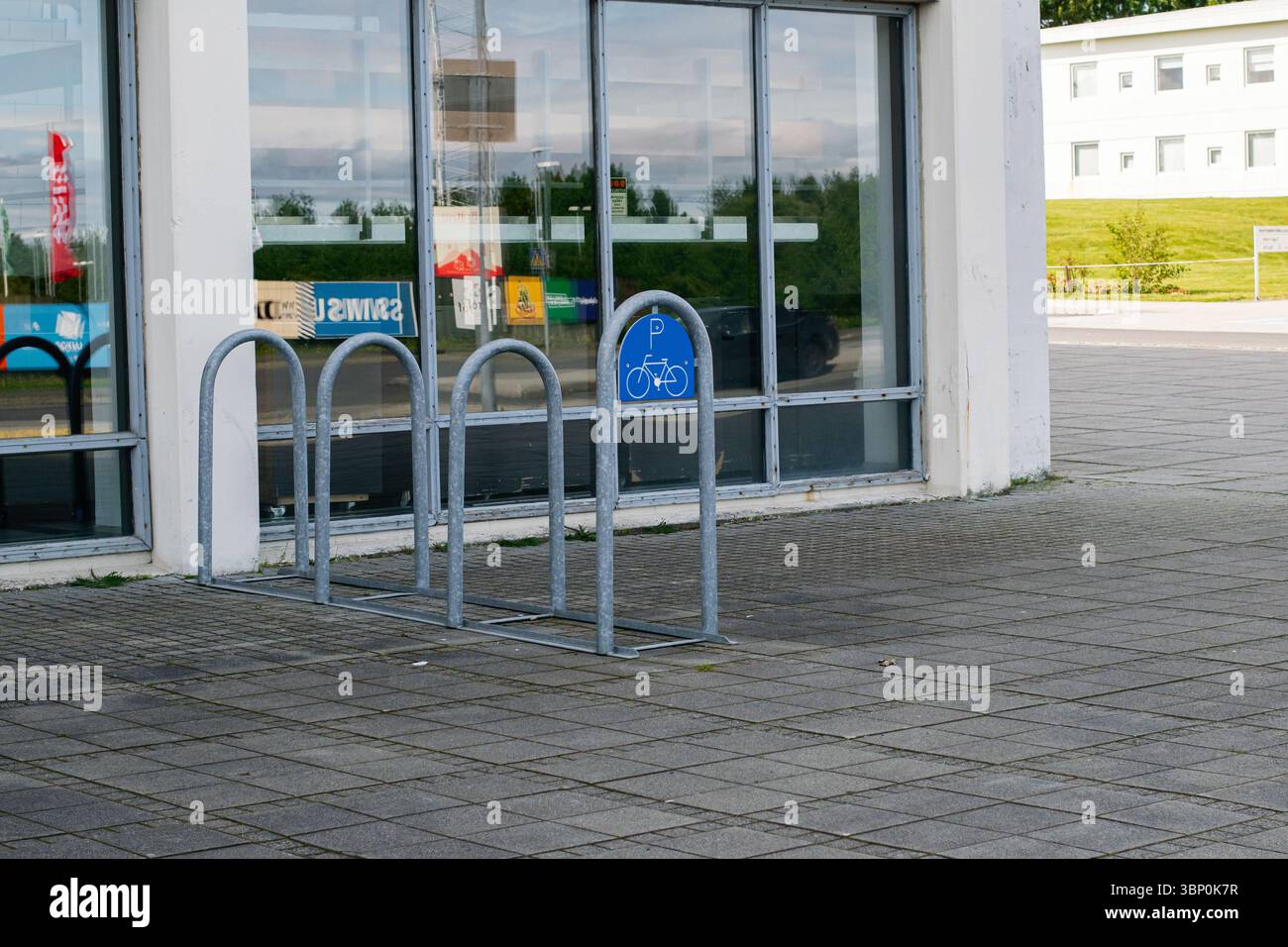 Reykjavik, Iceland - June 28, 2025: Metallic bicycle rack placed in a ...
