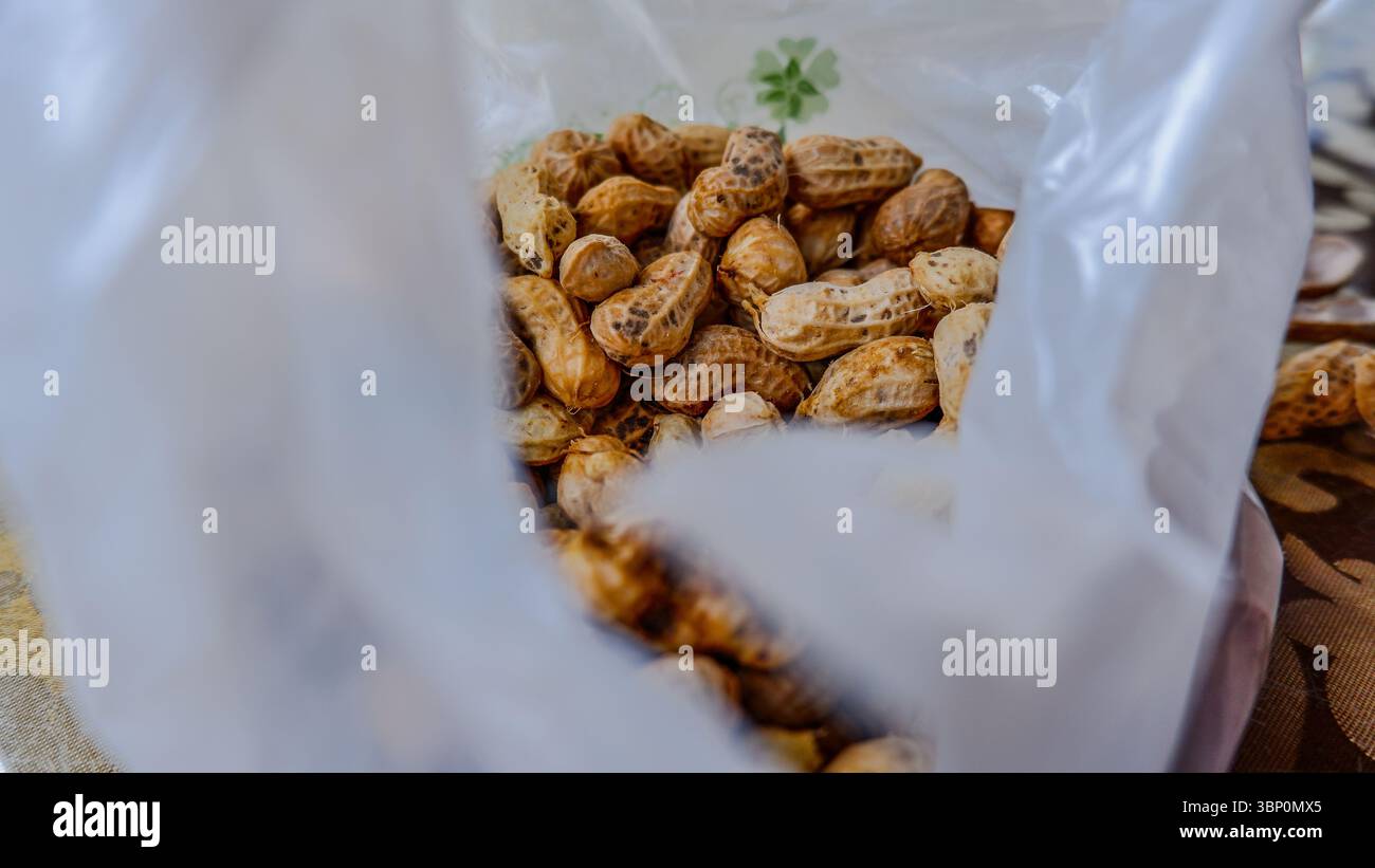 Boiled peanuts in plastic bag Stock Photo
