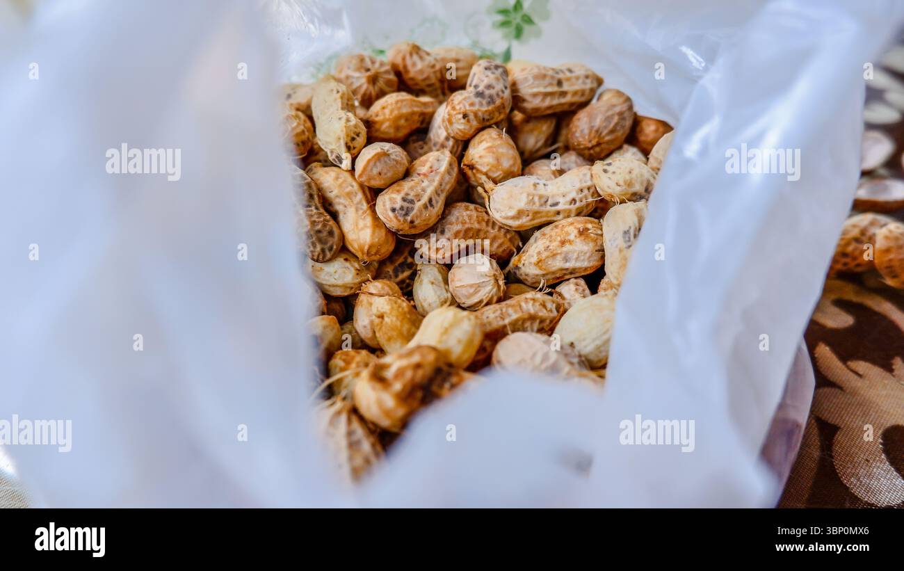 Boiled peanuts in plastic bag Stock Photo