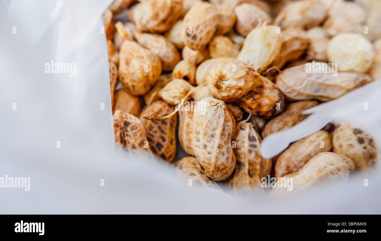 Boiled peanuts in plastic bag Stock Photo