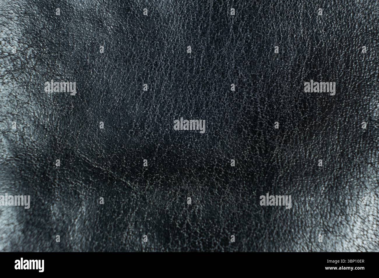 Minimalist Black Leather Texture Close-Up. Stock Photo