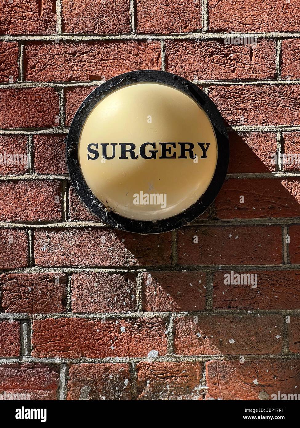 Old Fashioned Surgery Sign for Doctor's GP Surgery, Bloomsbury, London - Smartphone Captured Stock Image