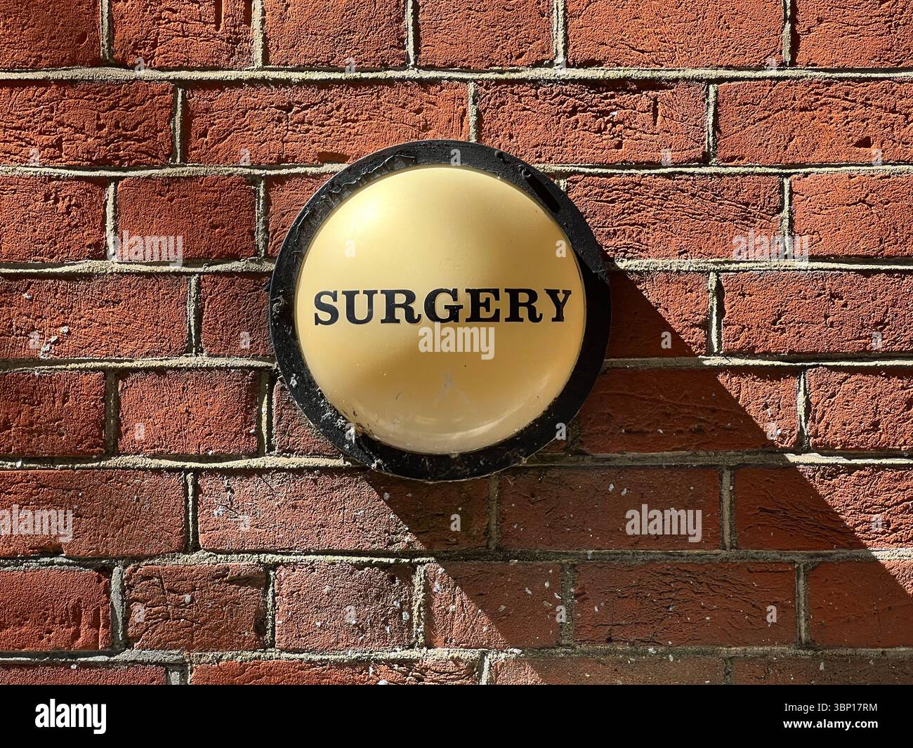 Old Fashioned Surgery Sign for Doctor's GP Surgery, Bloomsbury, London - Smartphone Captured Stock Image