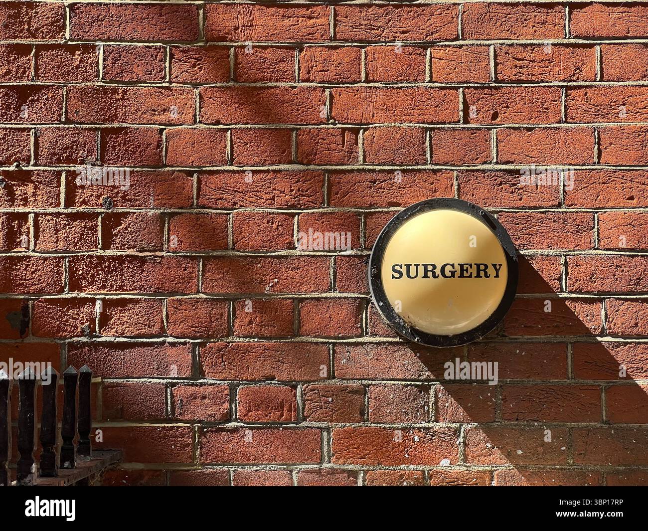 Old Fashioned Surgery Sign for Doctor's GP Surgery, Bloomsbury, London - Smartphone Captured Stock Image