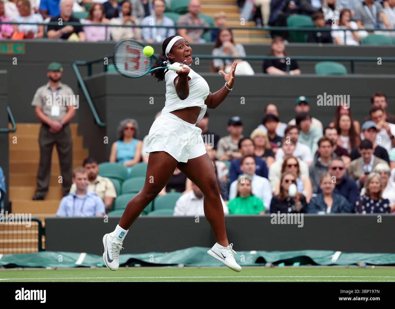 5th July 2025; All England Lawn Tennis and Croquet Club, London, England; Wimbledon Tennis Tournament, Day 6; Hailey Baptiste (USA) with a forehand shot to Mirra Andreeva (RUS) Stock Photo