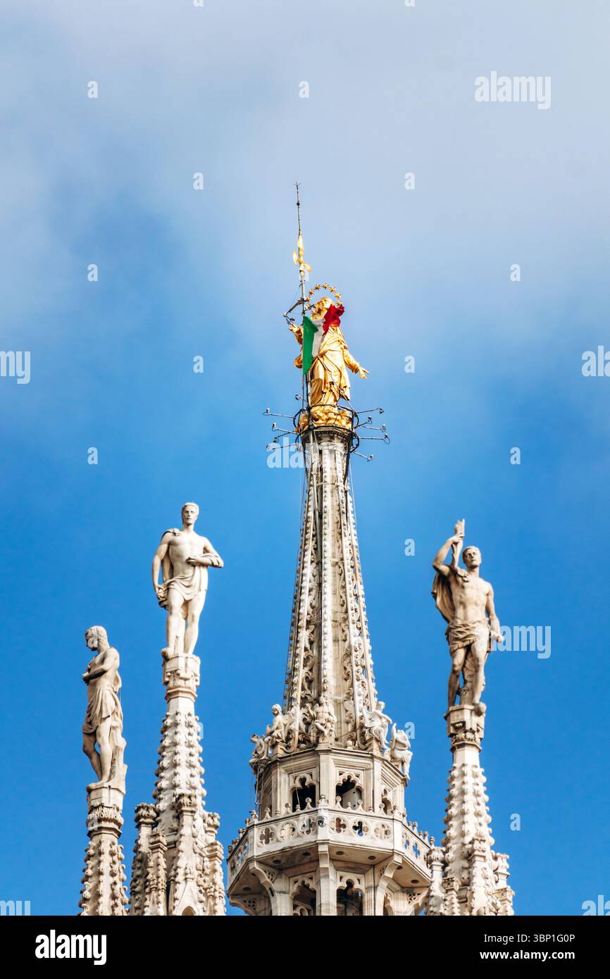 duomo-di-milano-gothic-facade-with-spires-and-golden-madonnina-statue
