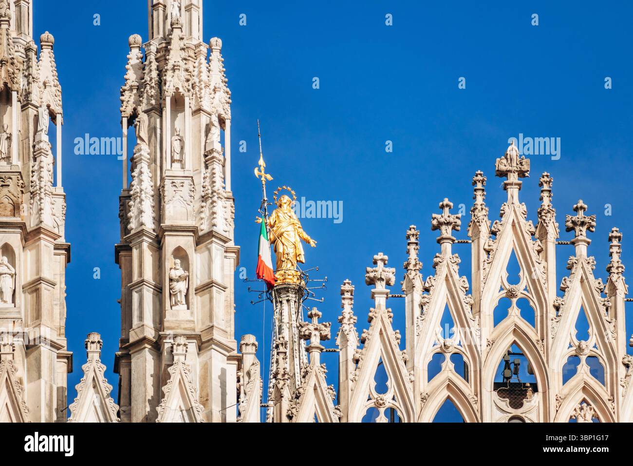 Duomo Di Milano Gothic Facade With Spires And Golden Madonnina Statue 