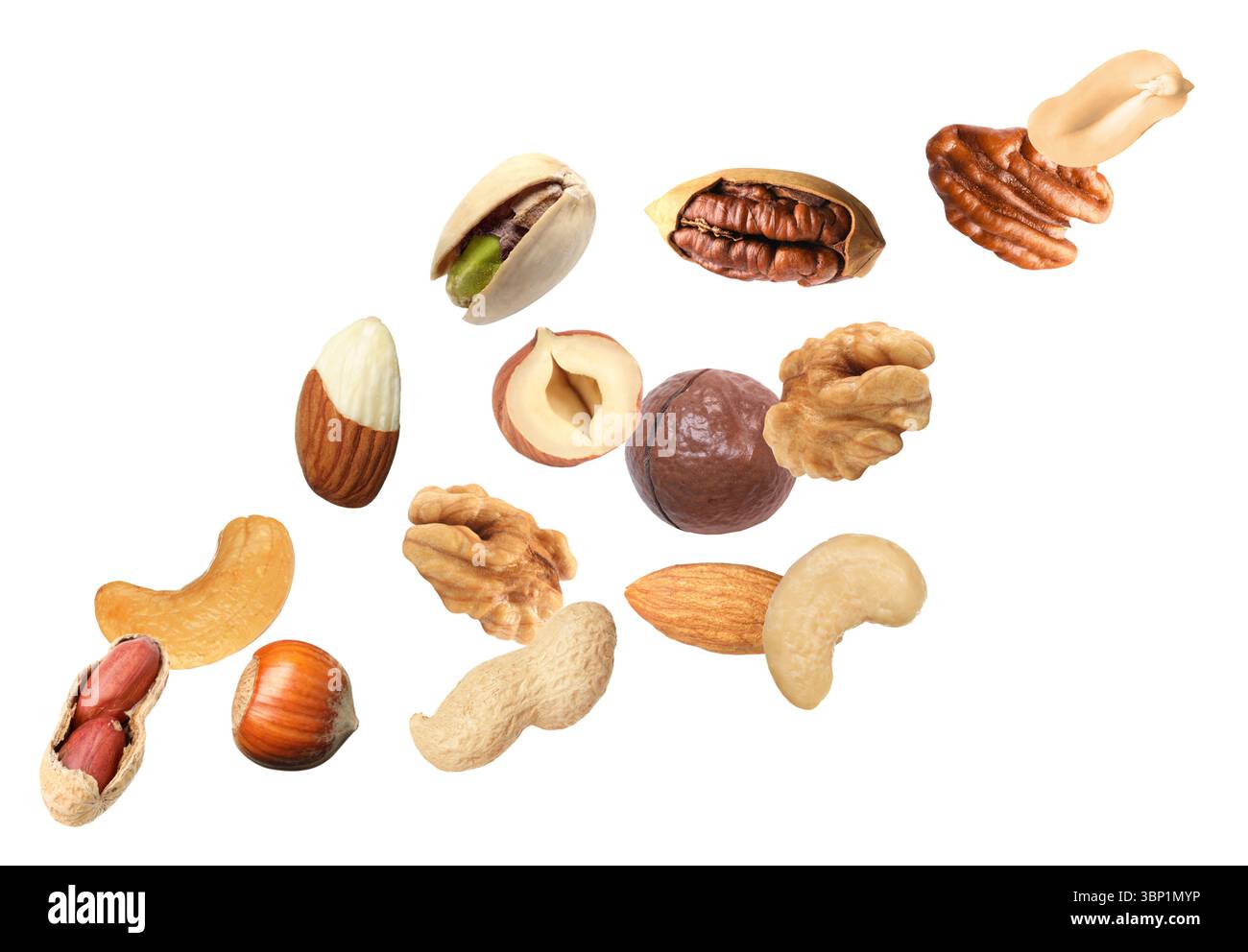 Peanut and other nuts flying on white background Stock Photo
