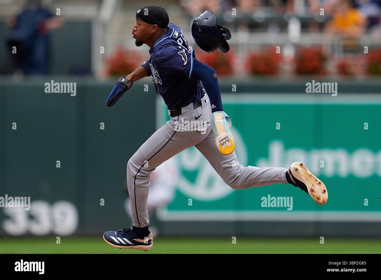 Tampa Bay Rays' Chandler Simpson (14) runs to score off an RBI-double ...