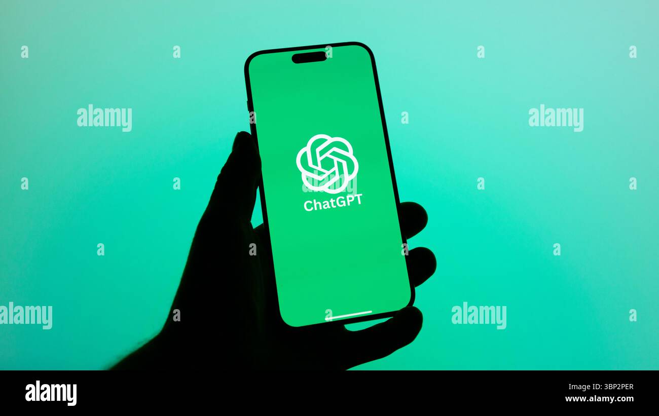This image shows the ChatGPT logo clearly displayed on the screen of an iPhone, representing the popular AI assistant app interface in a modern tech s Stock Photo