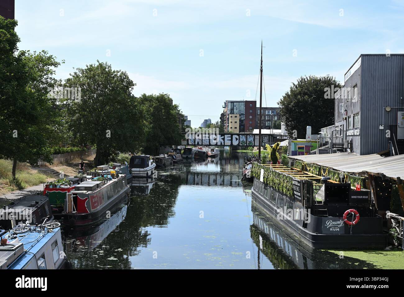 Canal boats on the River Lee Navigation Canal in Hackney Wick East London UK Stock Photo