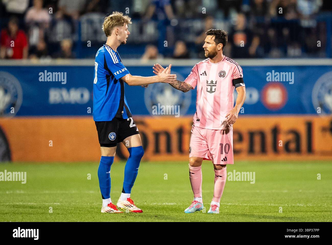 Inter Miami's Lionel Messi (10) and CF Montreal's Dawid Bugaj (27
