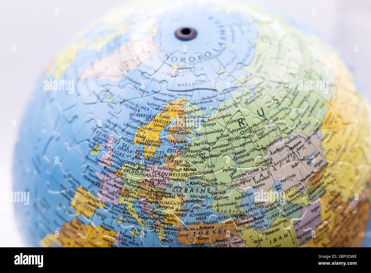 Puzzle globe. Map made from puzzle pieces Stock Photo
