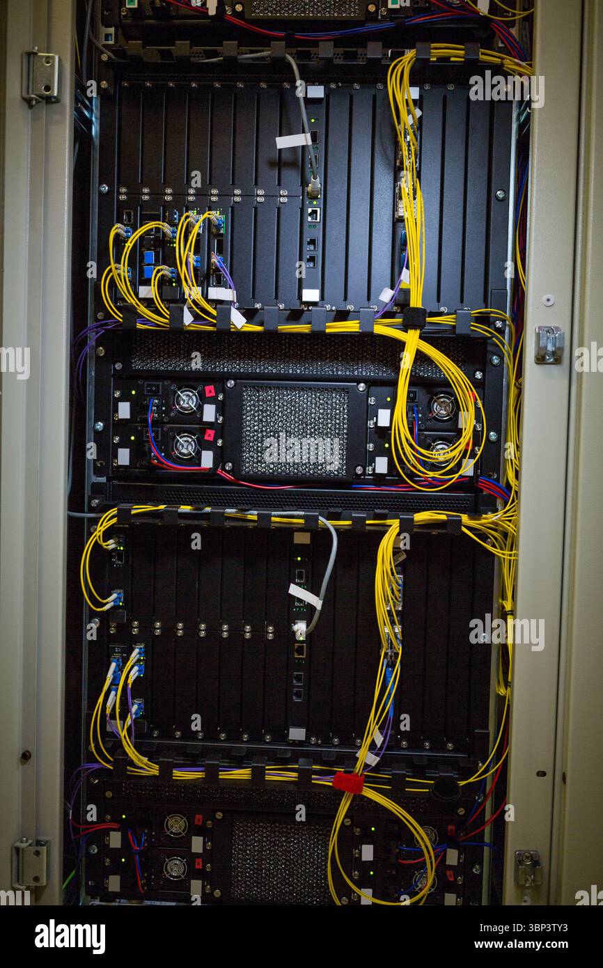 Server rack cabinet is being shown in vector illustration, with yellow fiber and patch cables Stock Photo