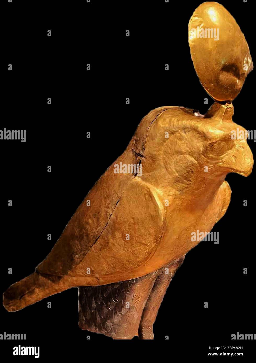 A photograph of a golden falcon coffin from the Ptolemaic Period, decorated in silver and gold. This held the mummified remains of the sacred falcon bird. From Dendera, Egypt., c. 100 BCE. Stock Photo