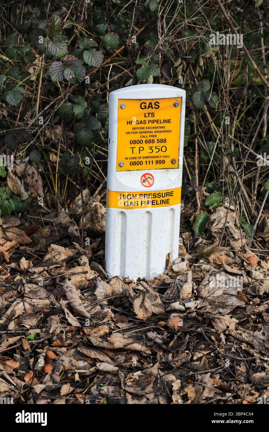 A high pressure gas pipeline marker post, Staffordshire, England, UK Stock Photo