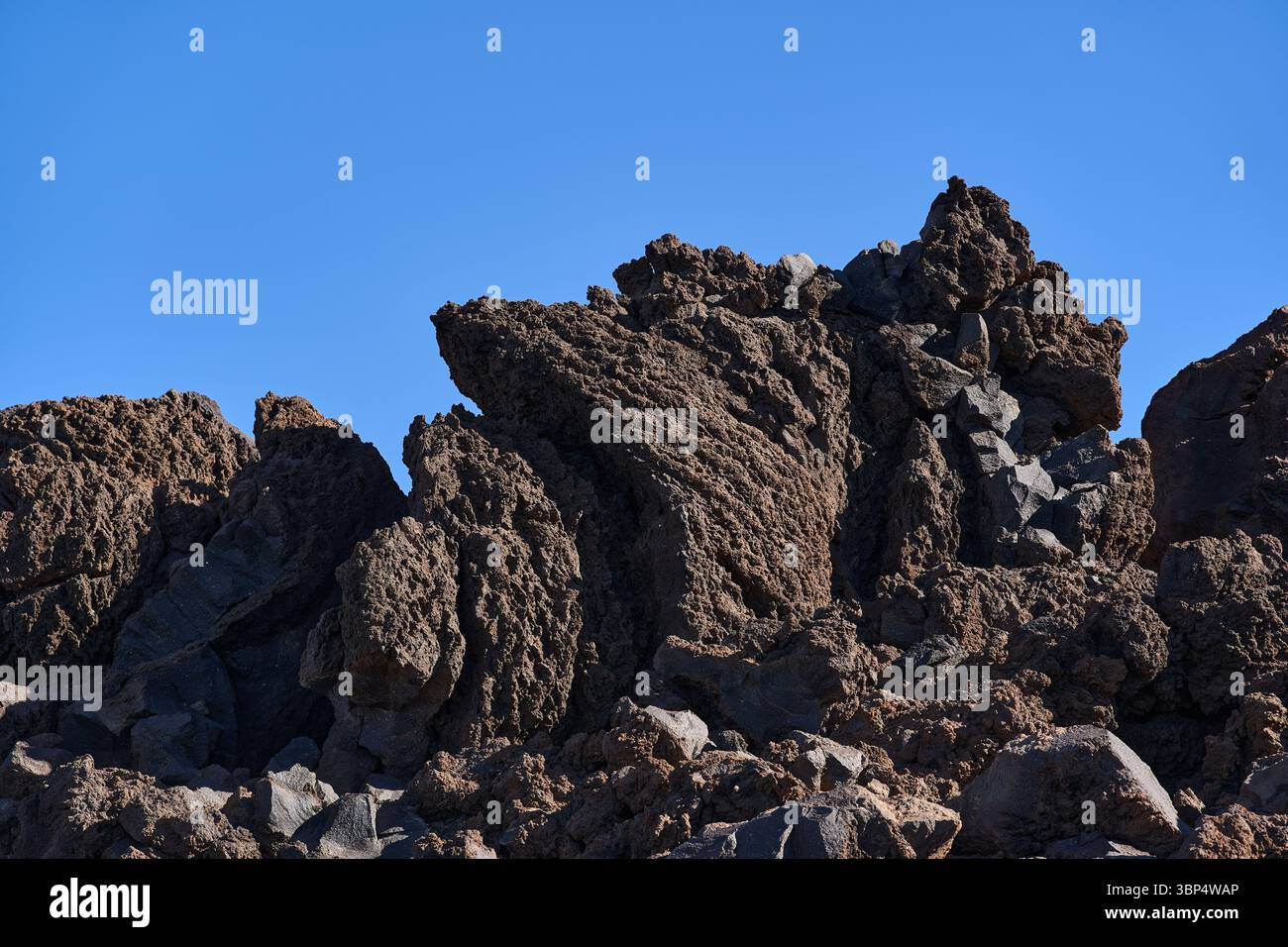 Prehistoric Jagged Rocks Close-up of jagged volcanic rock formations on Mount Teide showing ...