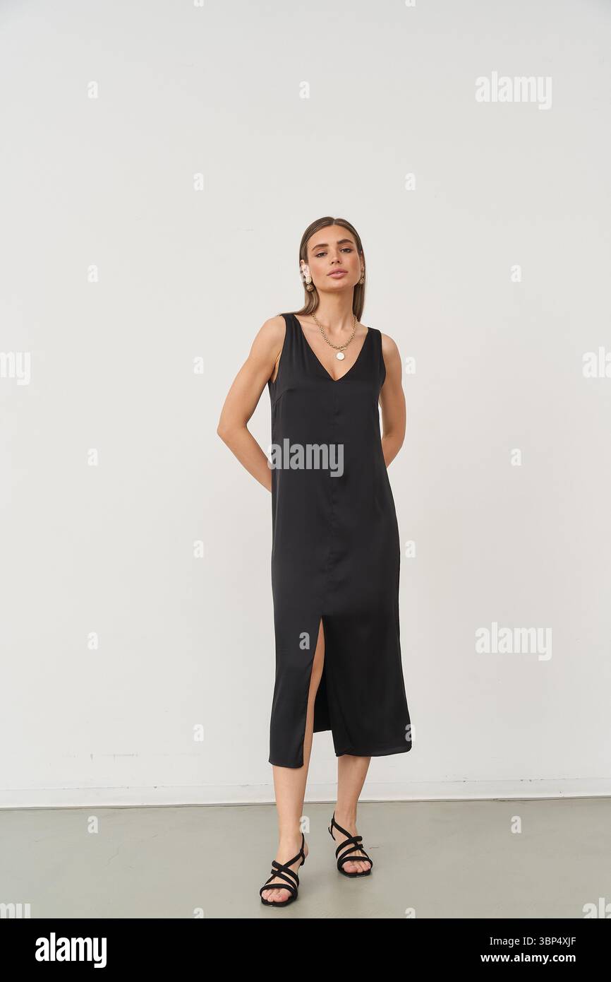 Knee length black dress hi-res stock photography and images - Alamy