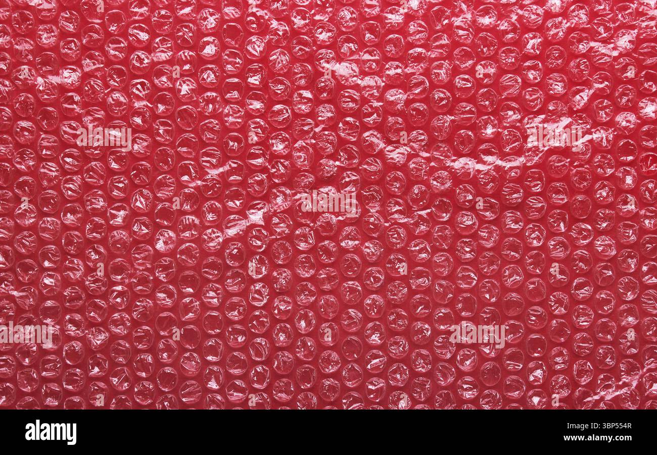 Red bubble wrap packing texture Stock Photo