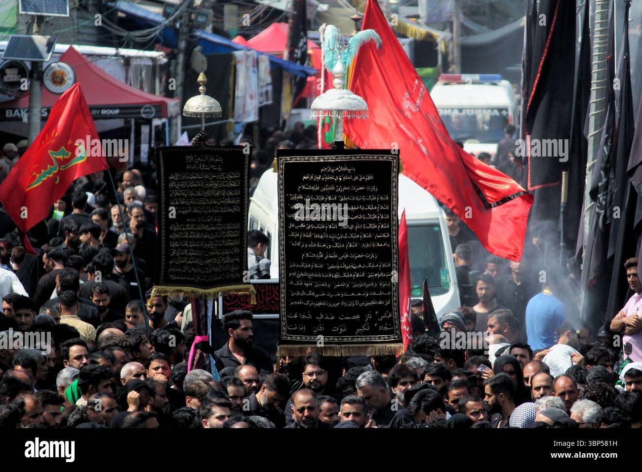 Kashmiri Shiite Muslims take part in a massive Muharram procession on ...
