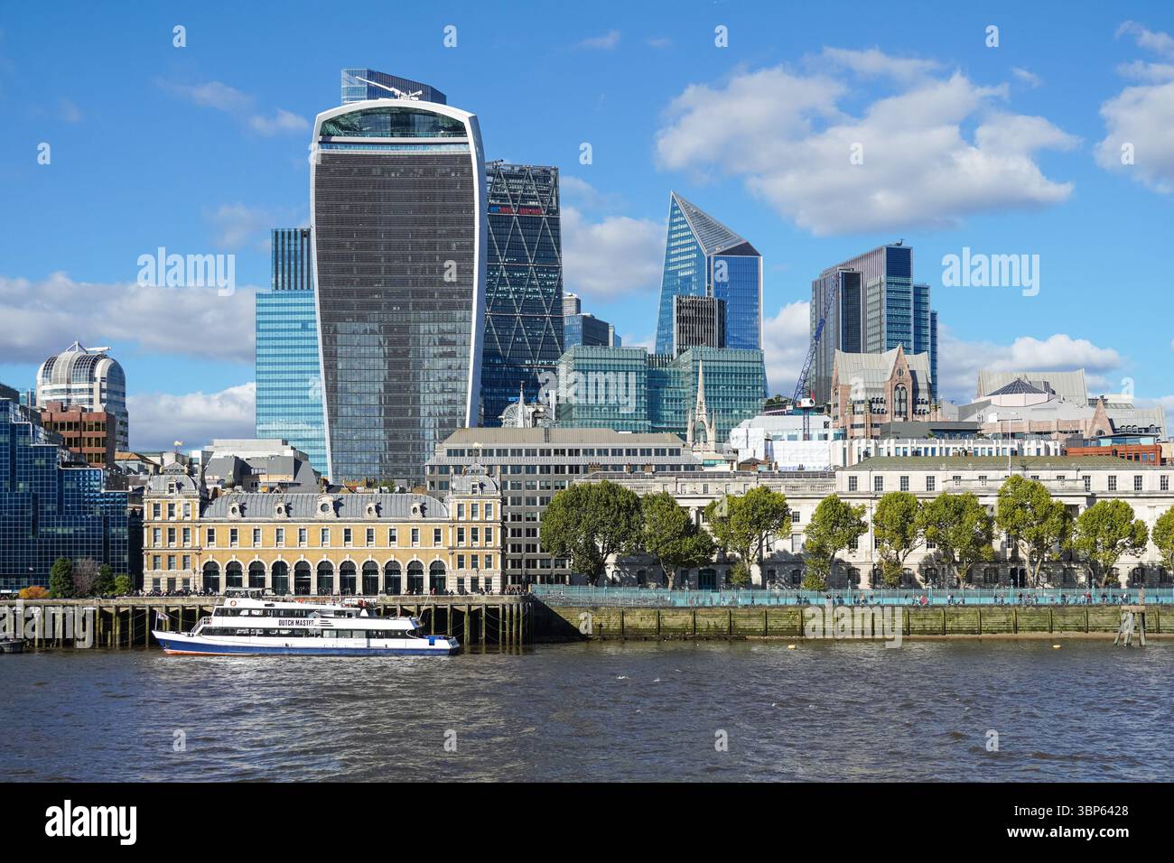 The City of London skyscrapers seen from the river Thames, The Square Mile business district in London, England, United Kingdom UK Stock Photo