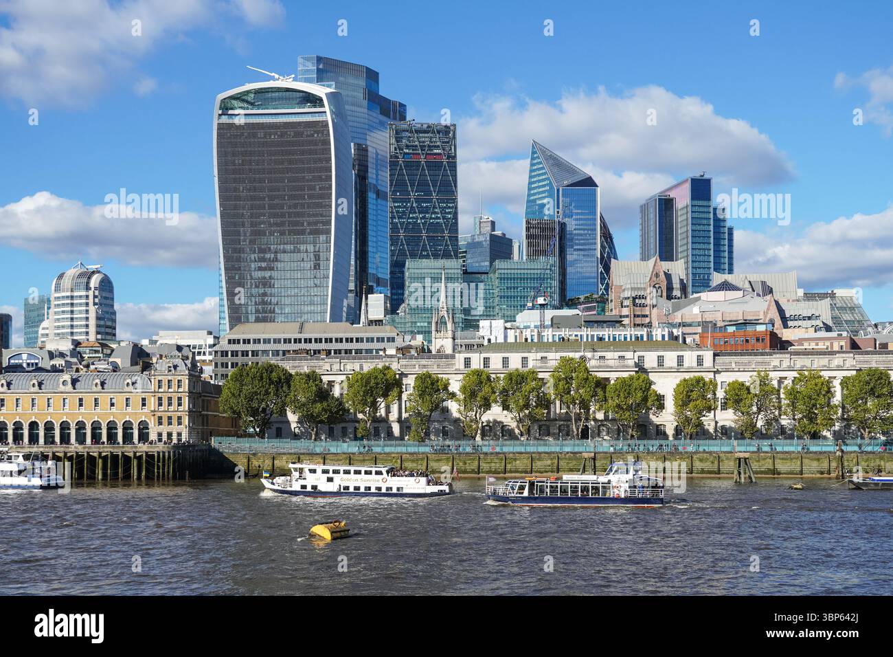 The City of London skyscrapers seen from the river Thames, The Square Mile business district in London, England, United Kingdom UK Stock Photo