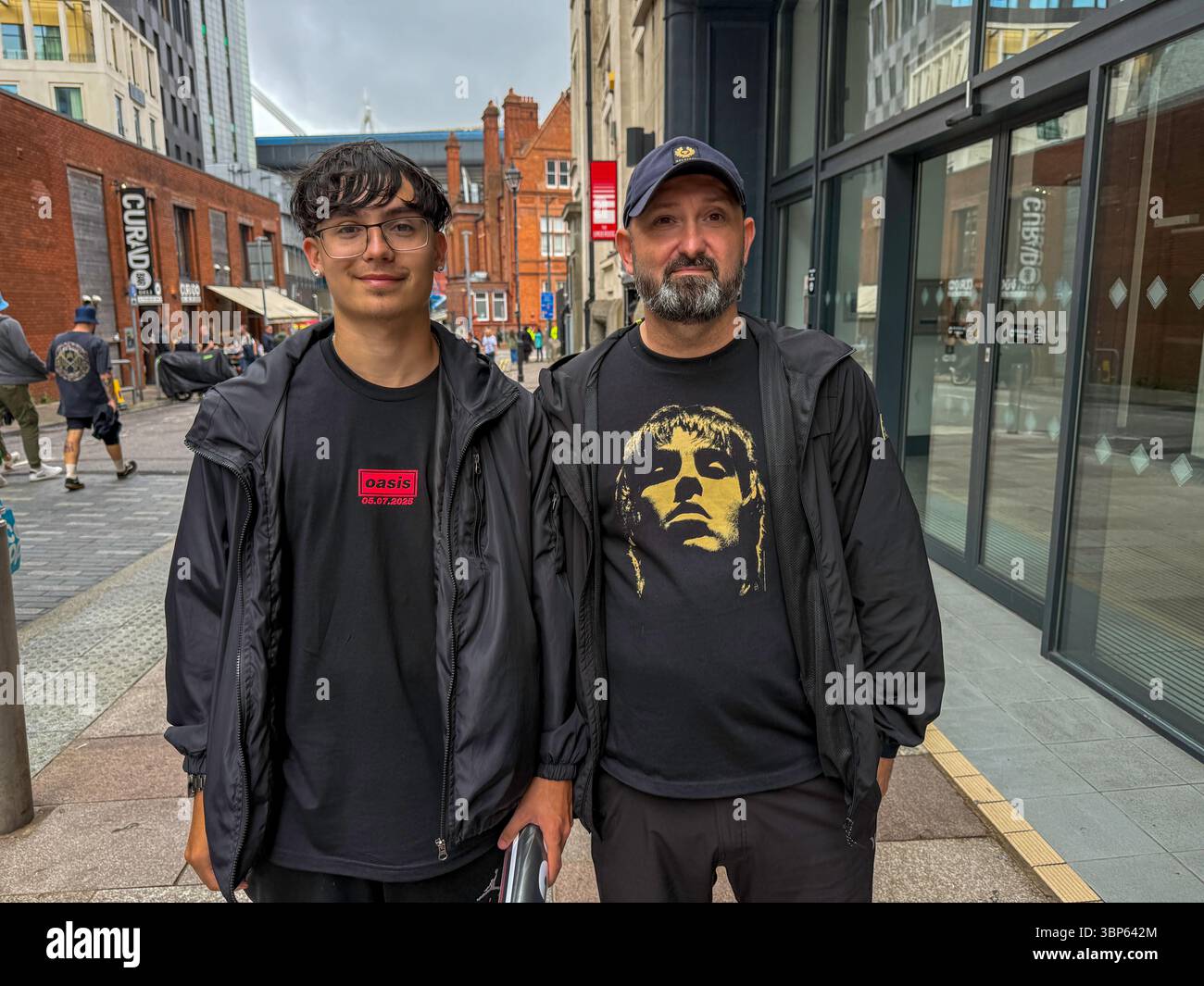 Oasis Fans and Buskers in Cardiff City Centre During Oasis Live ’25 Reunion Tour - Smartphone Captured Stock Image