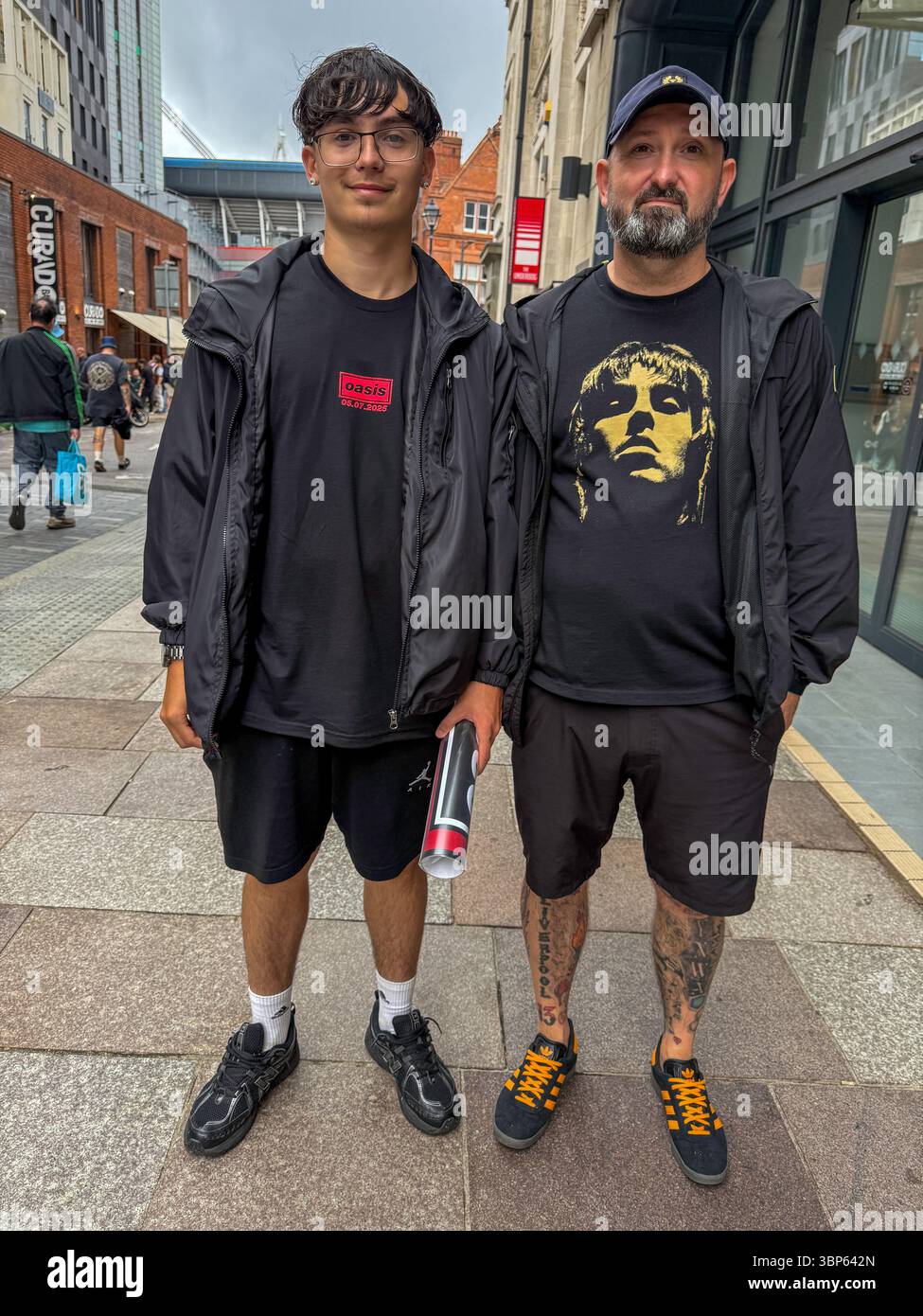 Oasis Fans and Buskers in Cardiff City Centre During Oasis Live ’25 Reunion Tour - Smartphone Captured Stock Image