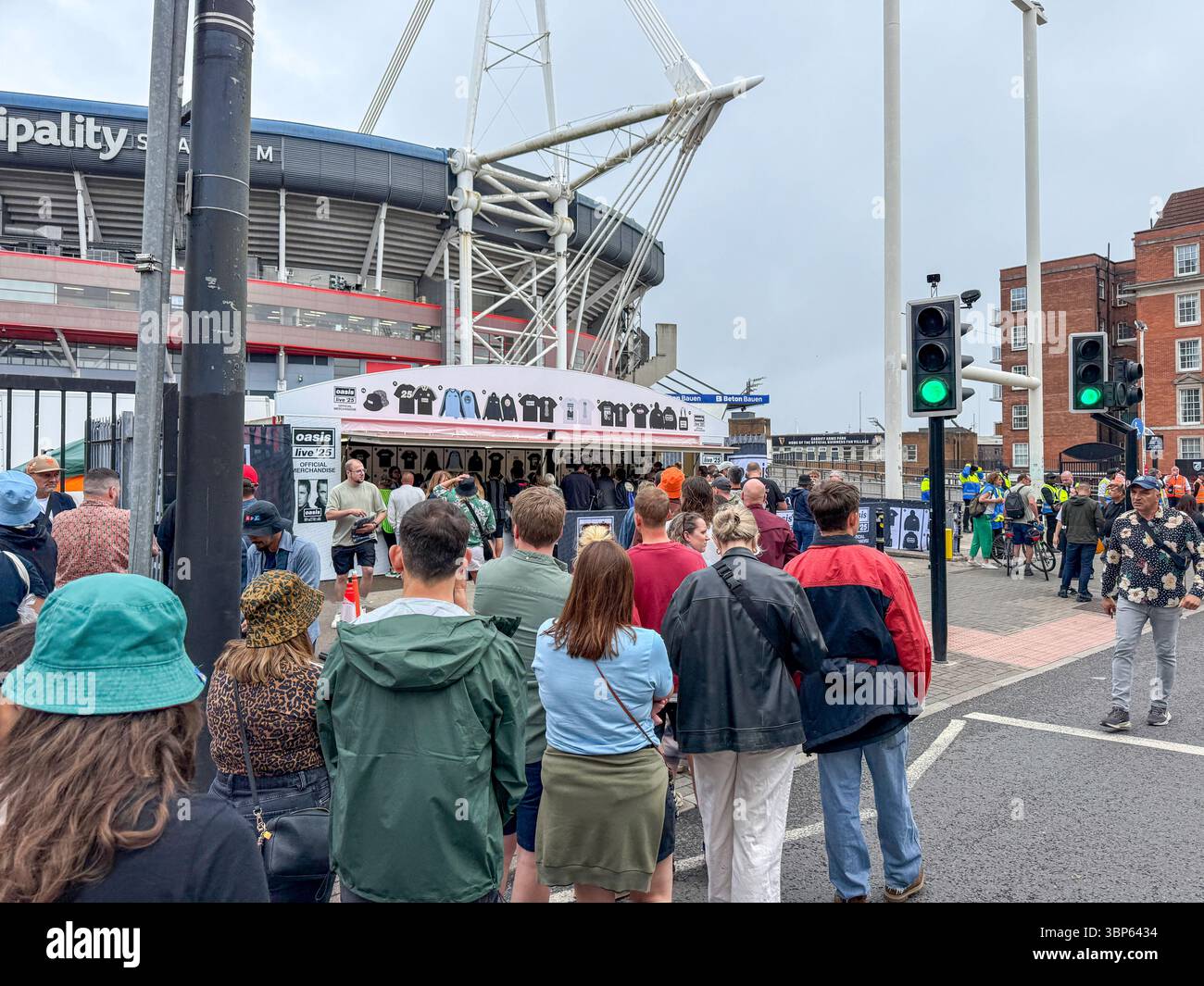 Oasis Fans and Buskers in Cardiff City Centre During Oasis Live ’25 Reunion Tour - Smartphone Captured Stock Image
