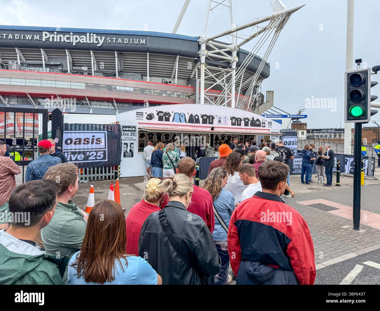 Oasis Fans and Buskers in Cardiff City Centre During Oasis Live ’25 Reunion Tour - Smartphone Captured Stock Image