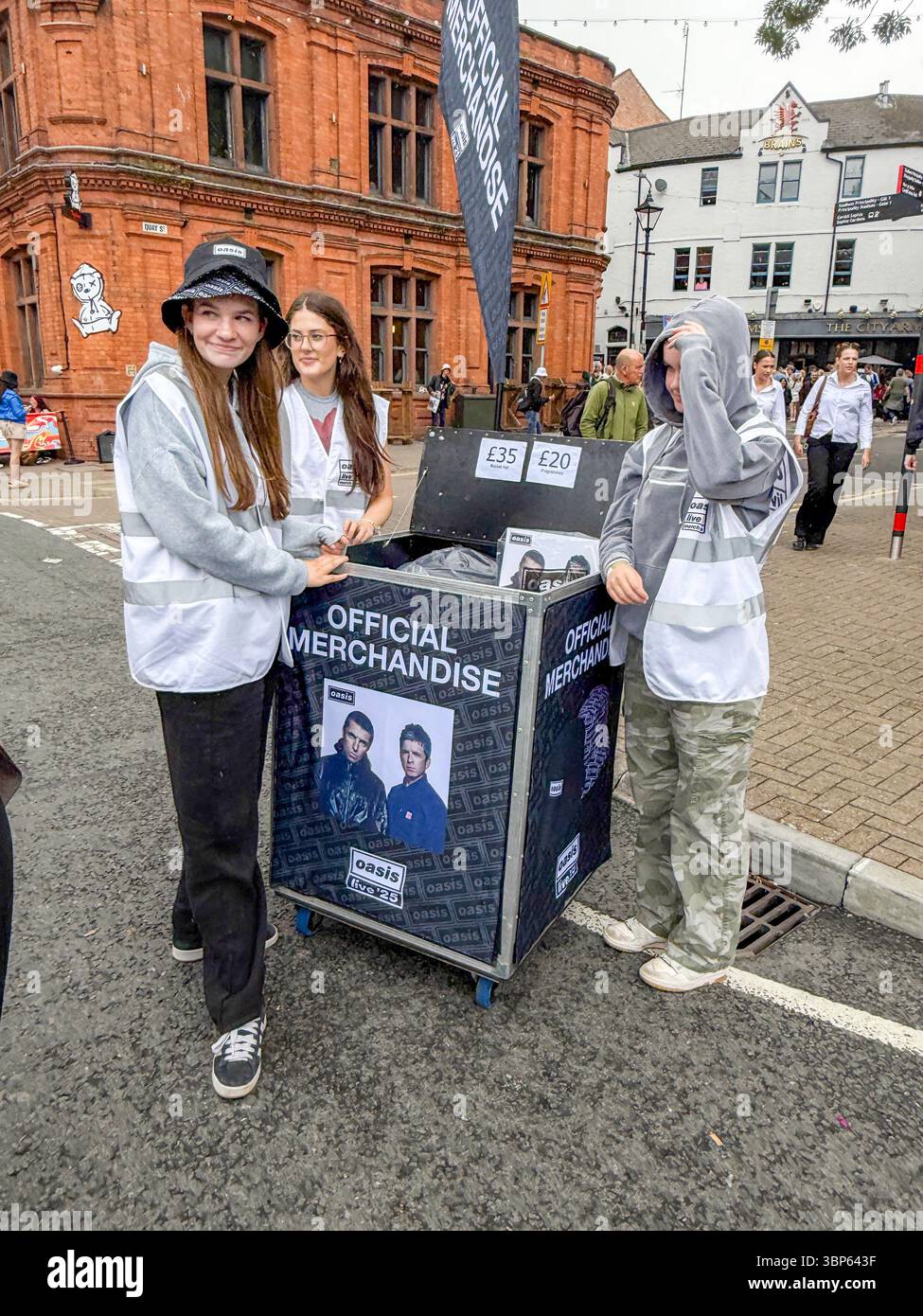 Oasis Fans and Buskers in Cardiff City Centre During Oasis Live ’25 Reunion Tour - Smartphone Captured Stock Image