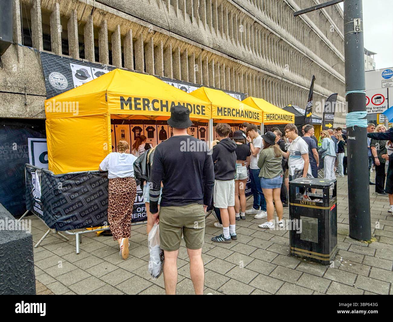 Oasis Fans and Buskers in Cardiff City Centre During Oasis Live ’25 Reunion Tour - Smartphone Captured Stock Image