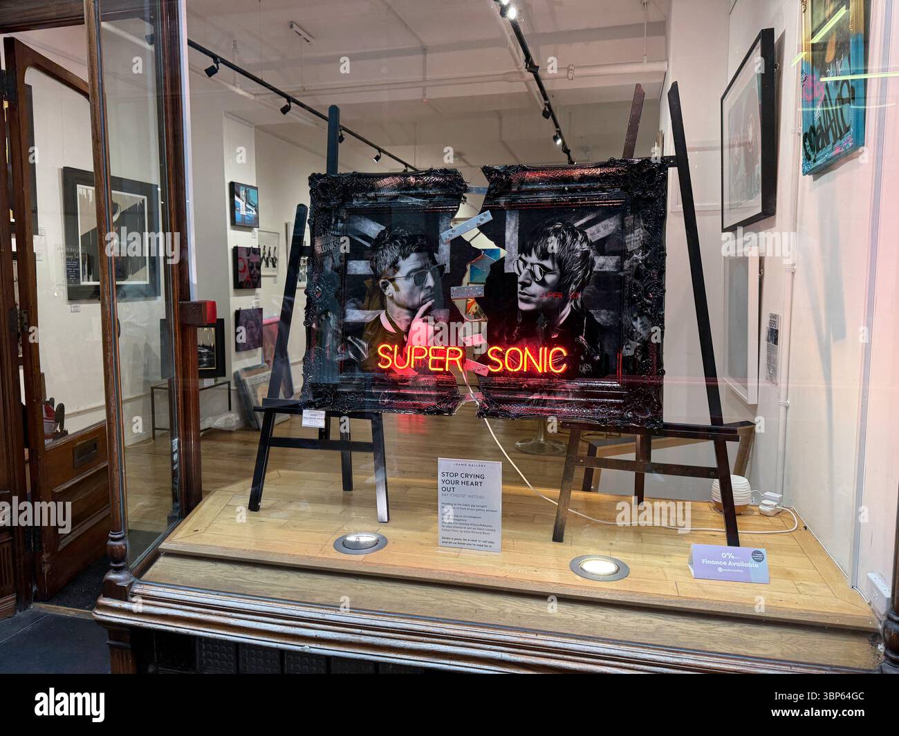 Oasis Paintings and Artwork on Display at Morgan Arcade Gallery Cardiff During Reunion Live '25 Tour Day - Smartphone Captured Stock Image