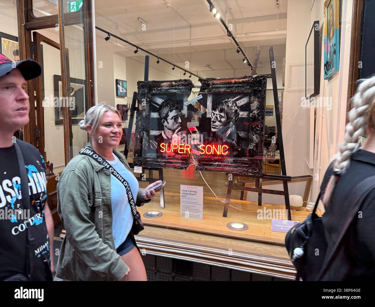 Oasis Paintings and Artwork on Display at Morgan Arcade Gallery Cardiff During Reunion Live '25 Tour Day - Smartphone Captured Stock Image