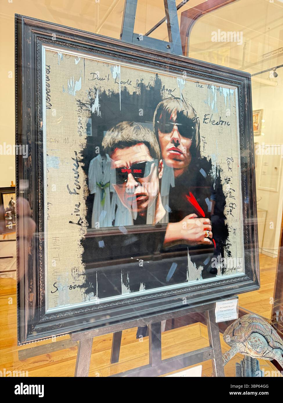 Oasis Paintings and Artwork on Display at Morgan Arcade Gallery Cardiff During Reunion Live '25 Tour Day - Smartphone Captured Stock Image