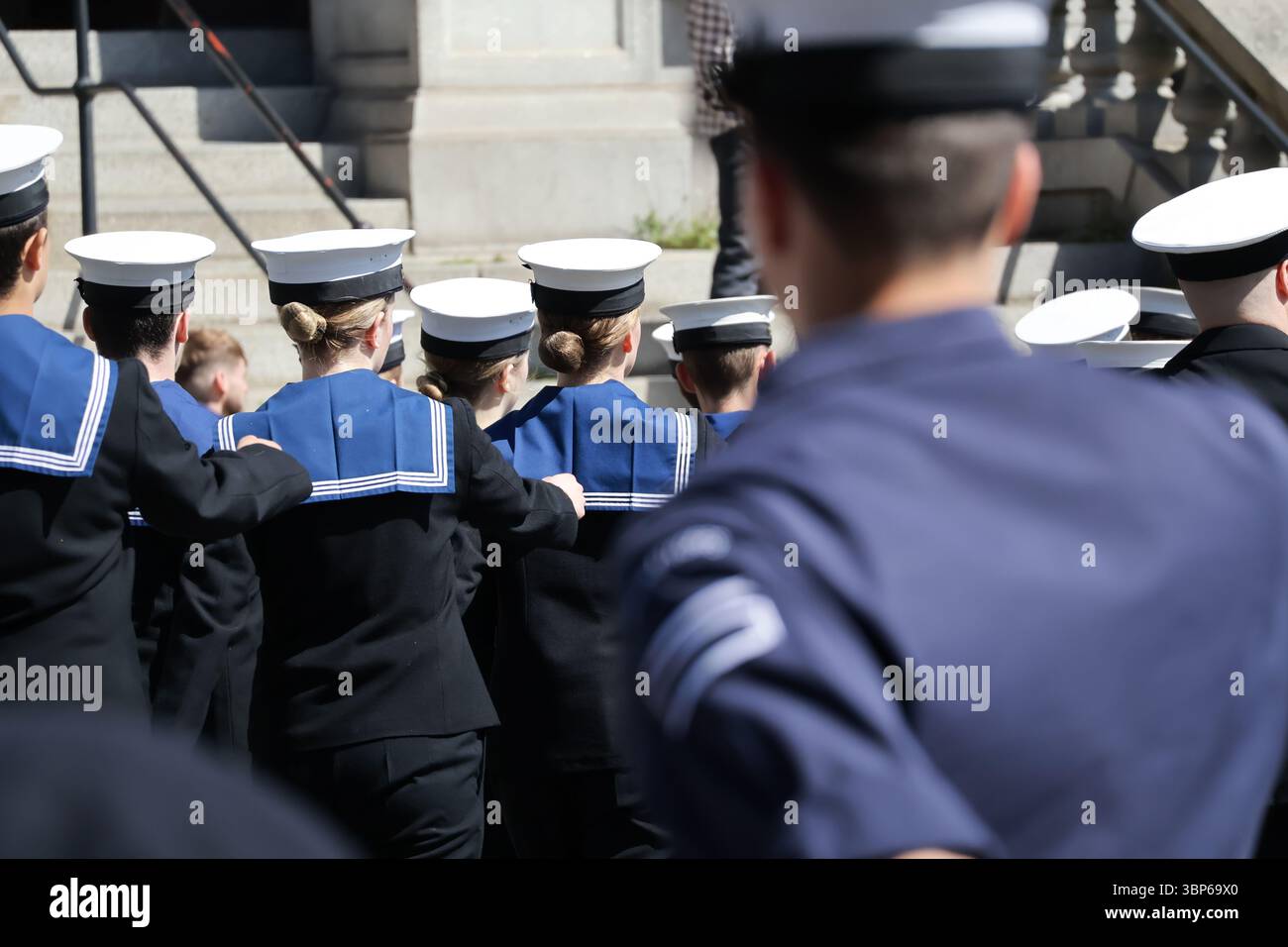 Navy sailors in uniform with their backs to camera Uniformed Heads and ...