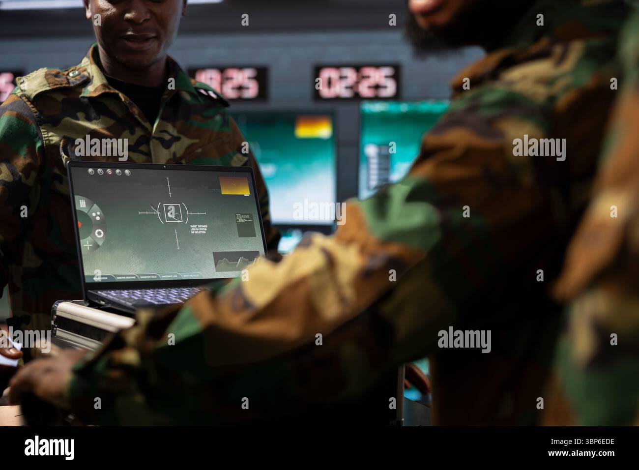 Military officers operating aerial systems on laptop device to support ...