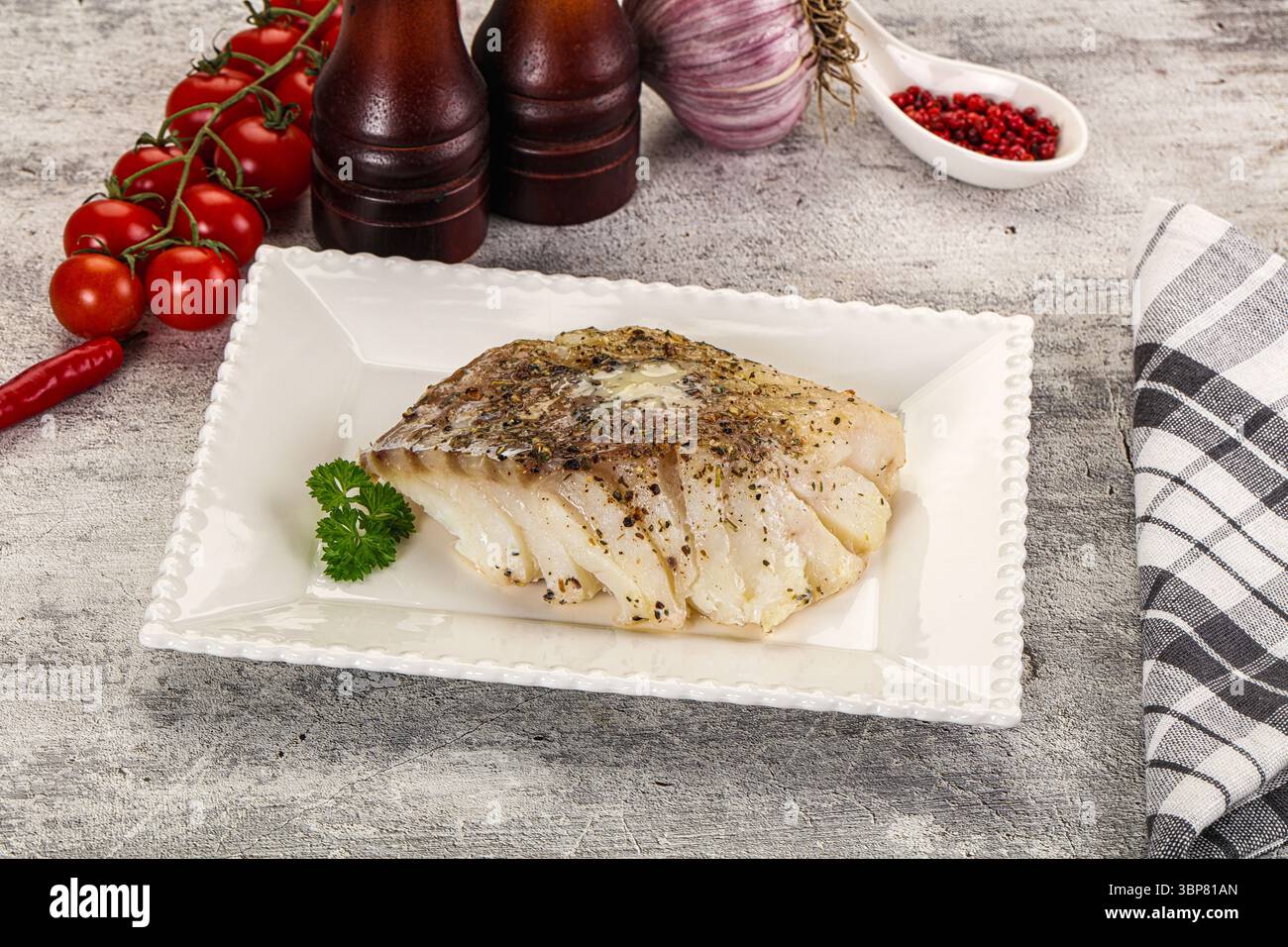 Dietary Baked cod fish fillet with spices Stock Photo - Alamy
