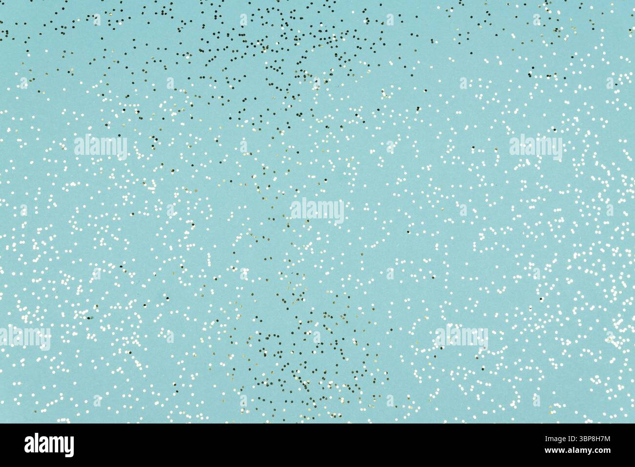 Blue Festive background texture with glittering silver confetti Stock Photo